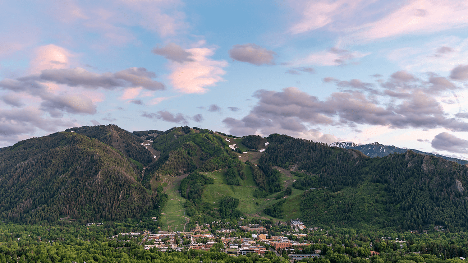 Aspen Mountain at Sunset, illuminated by the setting sun, town of Aspen is settled below the mountain