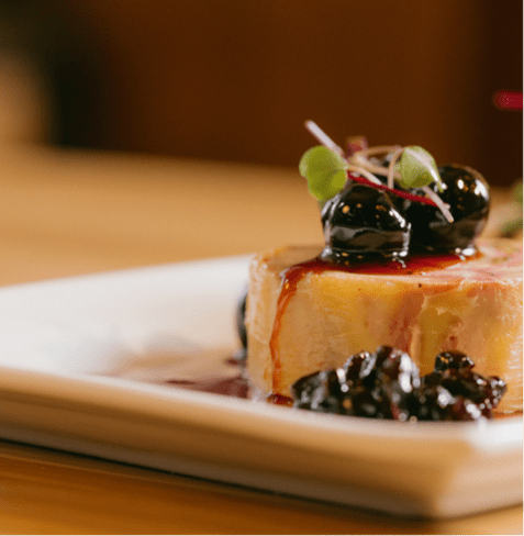 small tarte with fresh blueberries on top from the Cabin