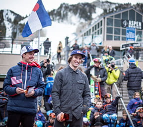 People gathered at Aspen Mountain Gondola Plaza to Celebrate two Aspen Athletes going to the Olympics. 