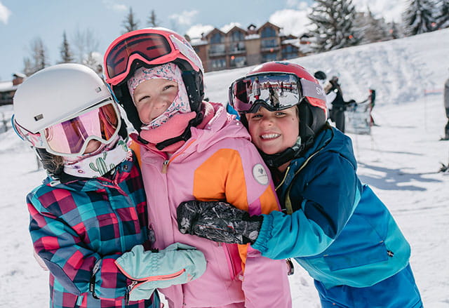 Kids enjoying their ski vacation at Aspen Snowmass
