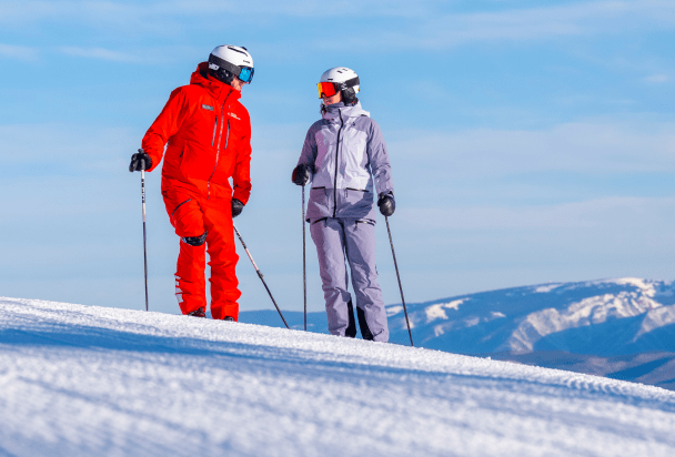 Aspen Snowmass ski coach and their student on the slopes