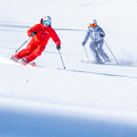two skiers in aspen