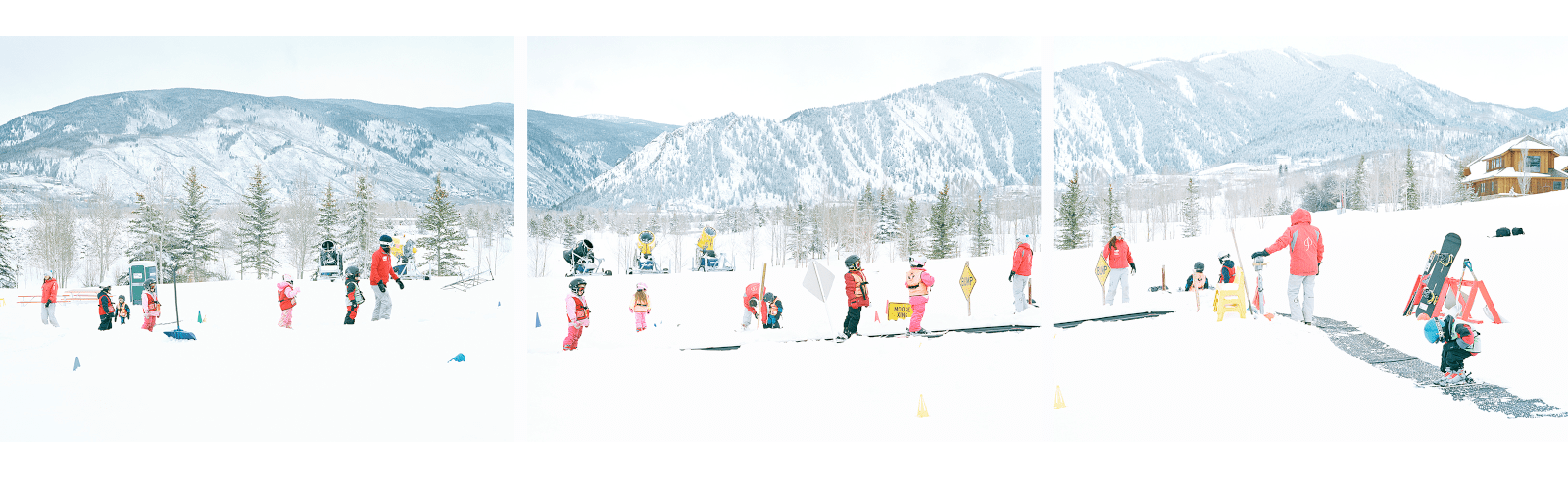 a group of children on skis in the snow