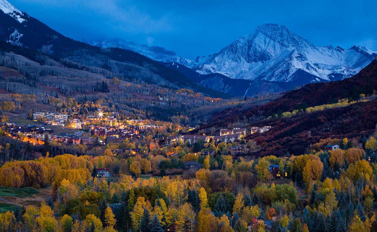 Snowmass at sundown with Mount Daly in the distance