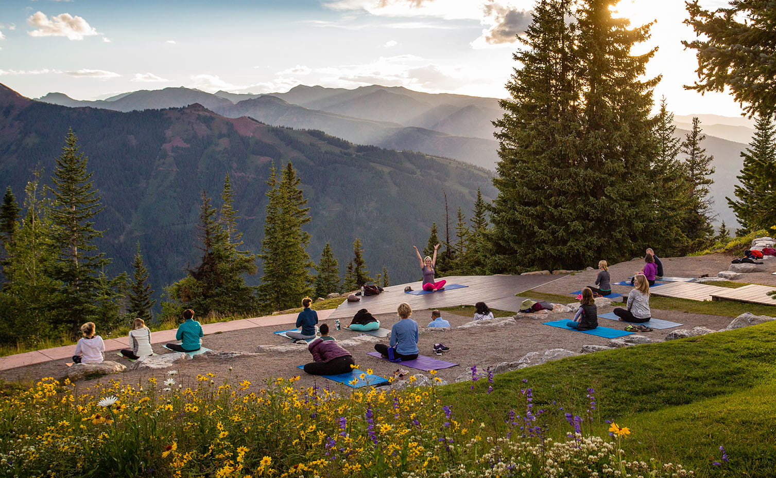 Yoga atop Aspen Mountain at the wedding deck. 