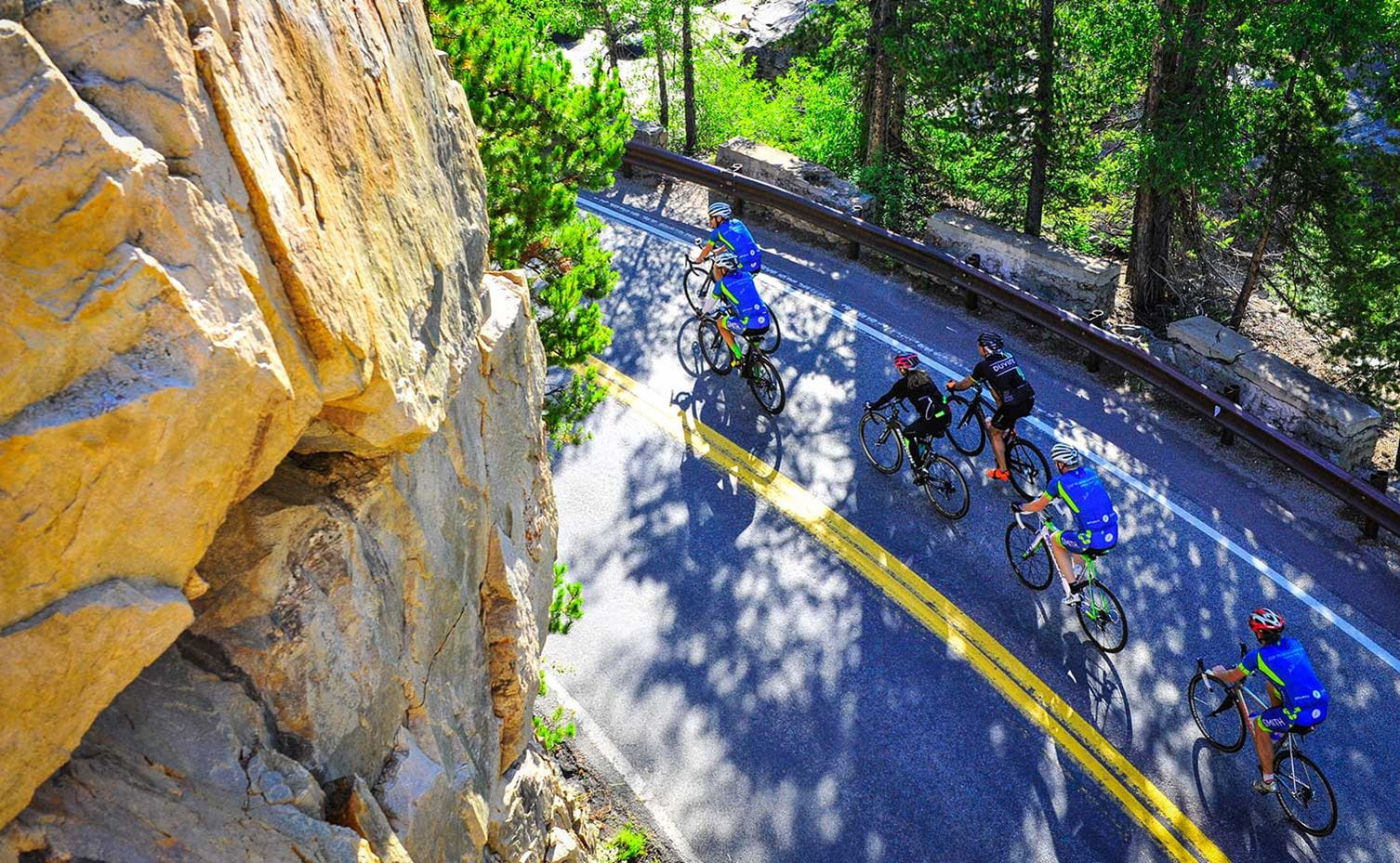 A group of cyclists climbing Independence Pass near Aspen, Colorado