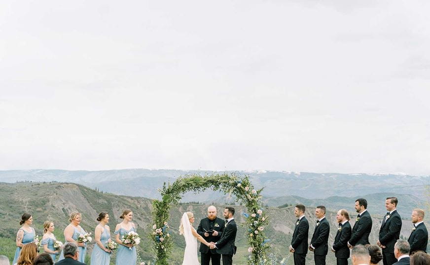 Lynn Britt Cabin wedding at the altar