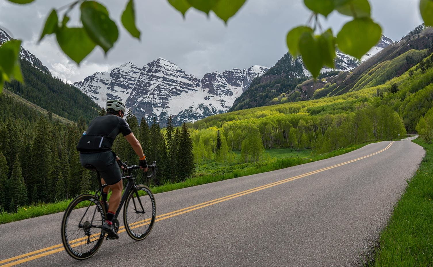 Cyclist riding up to Maroon Lake