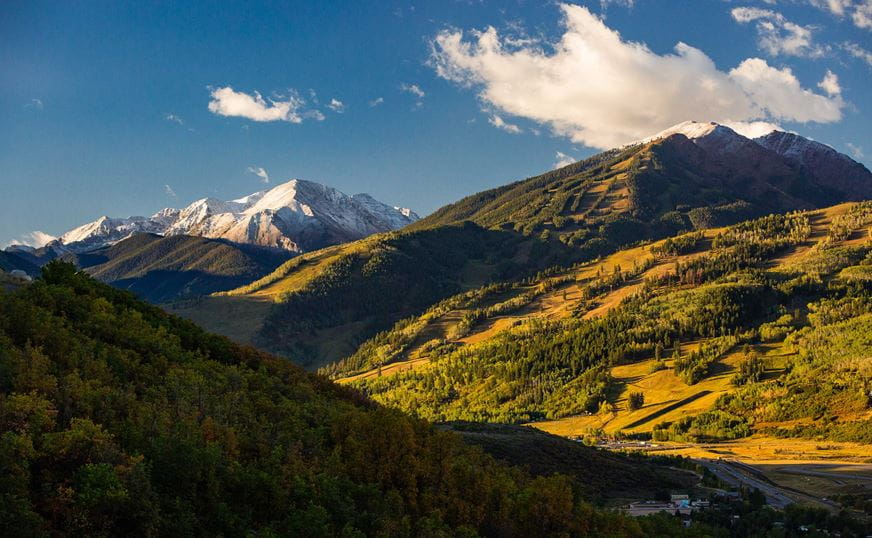 View of Buttermilk and Aspen Highlands from the ridge adjacent to the resorts, in the summer time.