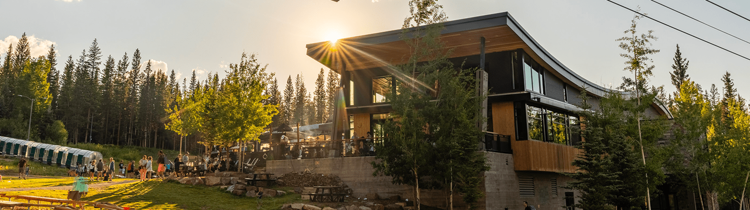Elk camp lodge and gondola at sunset in the summer