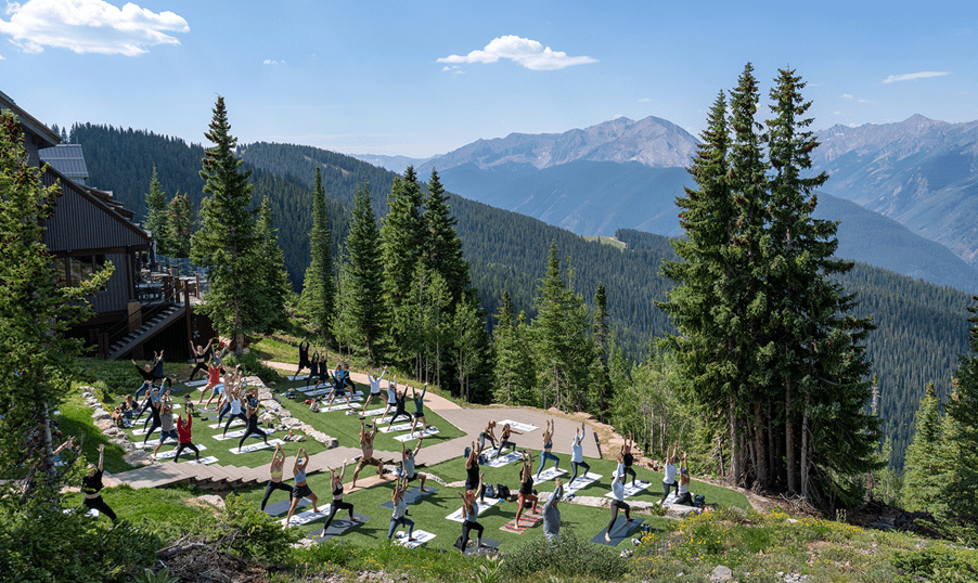 Aerial view of yoga on Aspen Mountain in the summer