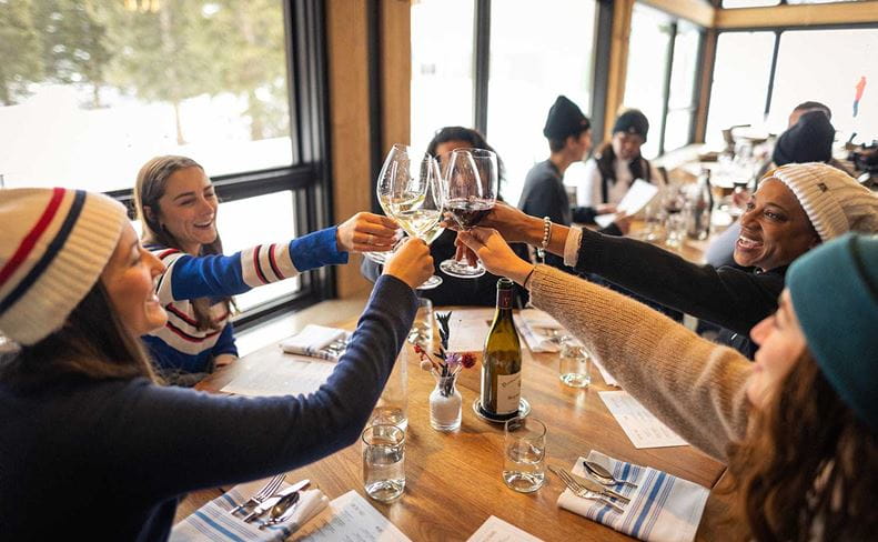 Alpin Room diners raise a glass to a good time