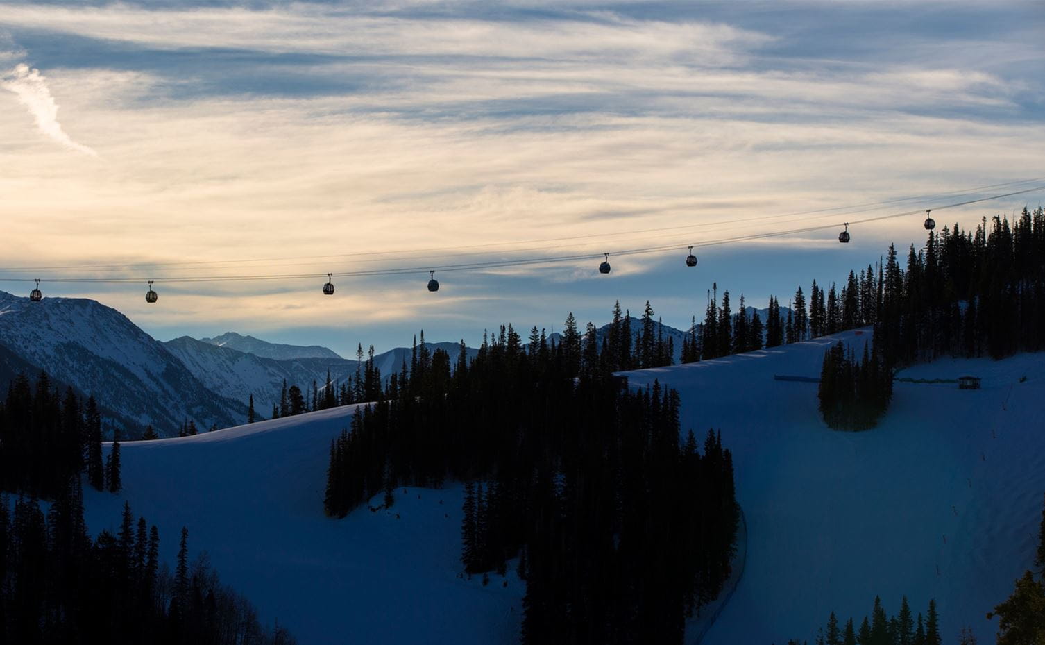 Backlit photo of the Silver Queen Gondola at Aspen Mountain