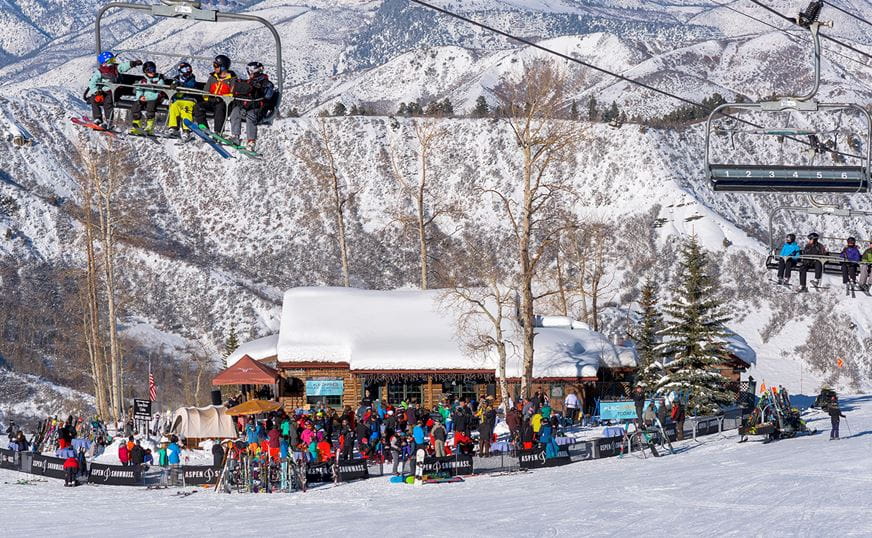 Crowd at Lynn Britt cabin for lunch in Snowmass