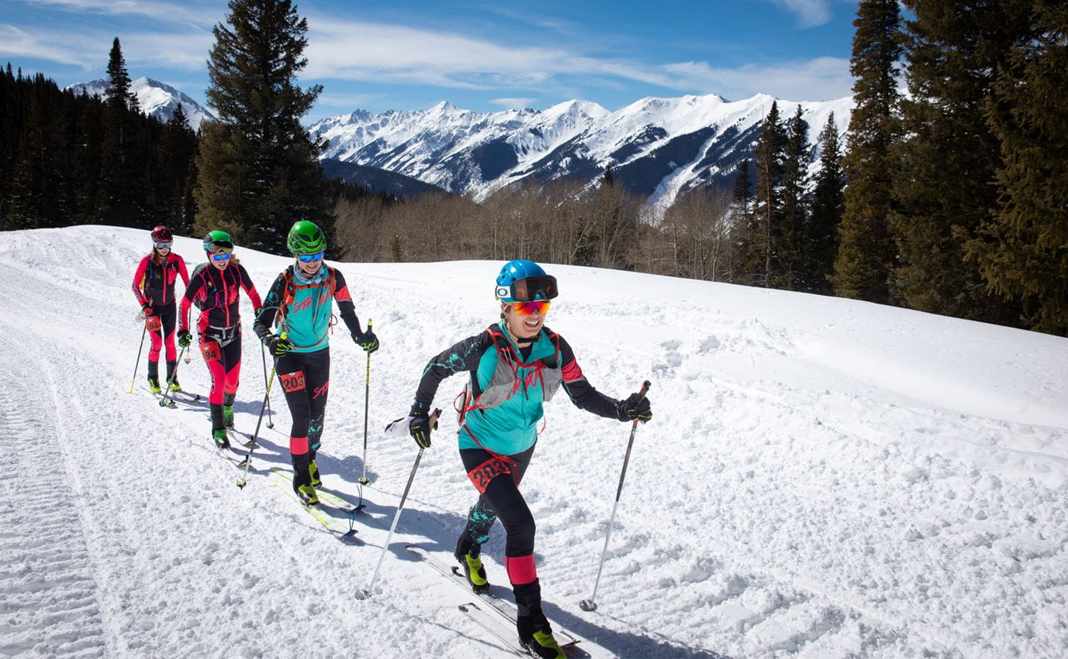 Ski mountaineers in a row during the Audi Power of Four Ski Mountaineering race at Aspen Snowmass