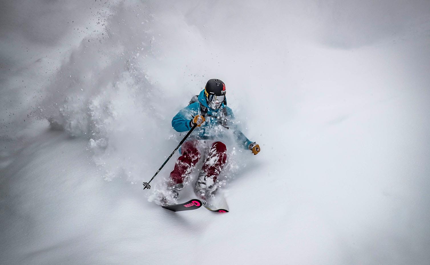 Skier in the powder on Aspen Mountain. 