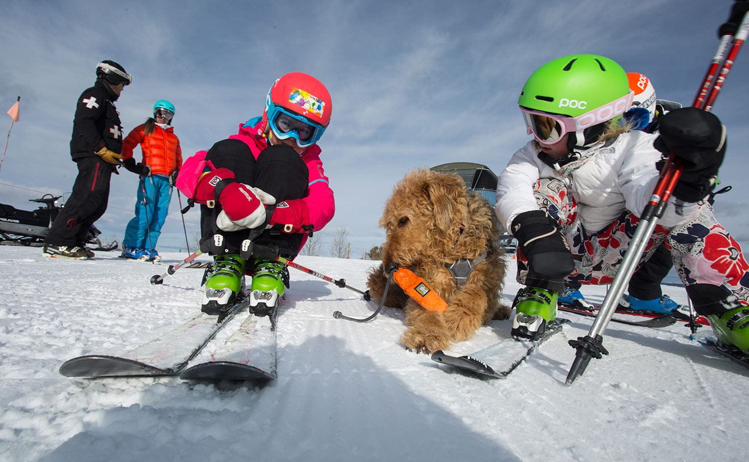 Kids and ski patrol at Aspen Snowmass