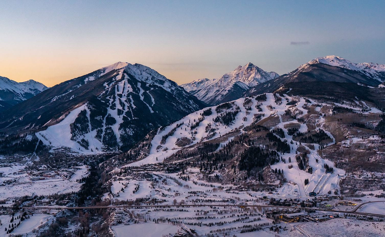 A view at dawn of Aspen Highlands, Pyramid Peak and Buttermilk