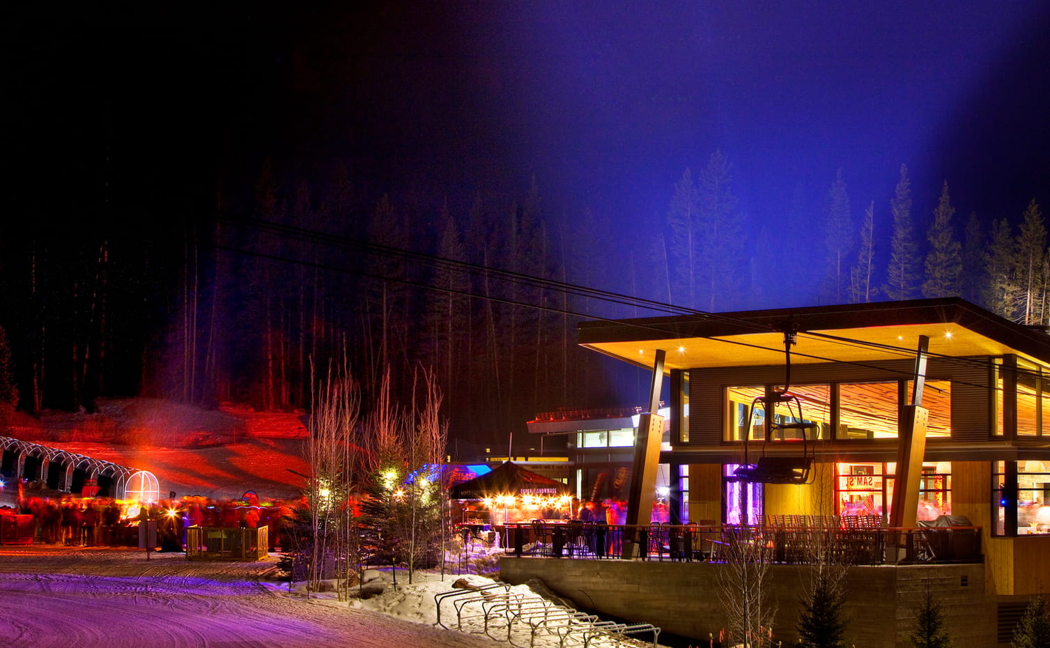 Ullr Nights glows at Elk Camp at night on Snowmass