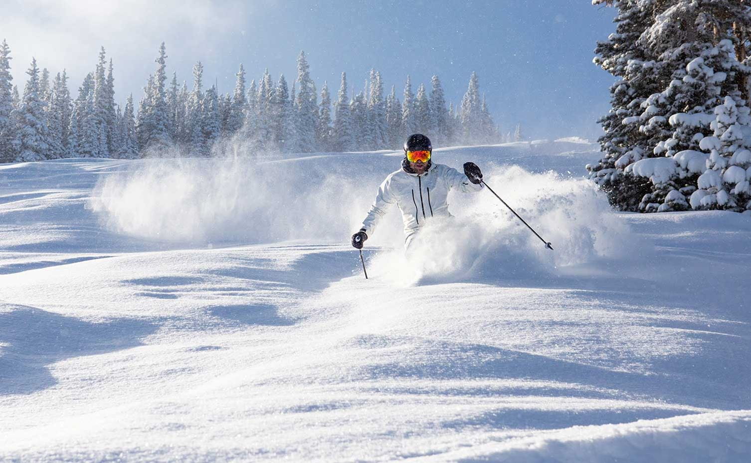 Skier enjoying a powder day all by themselves on Snowmass