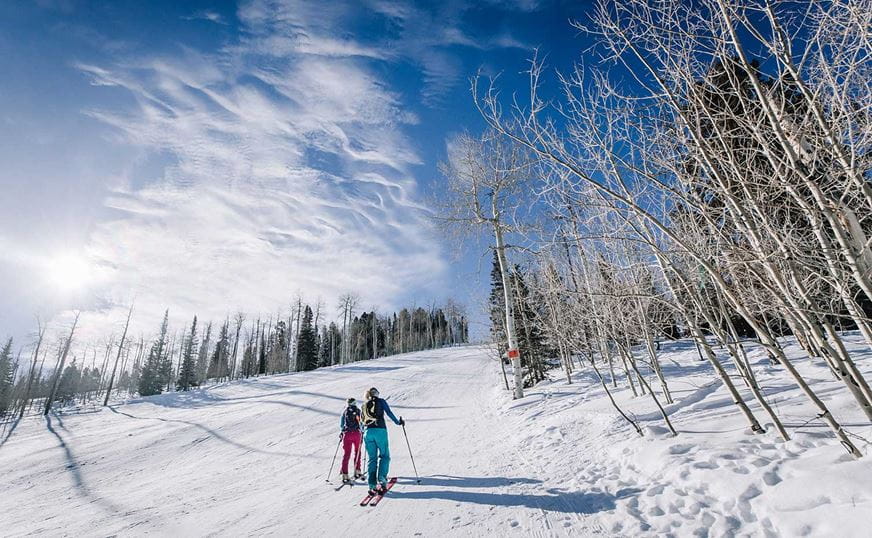 Two friends uphill Buttermilk