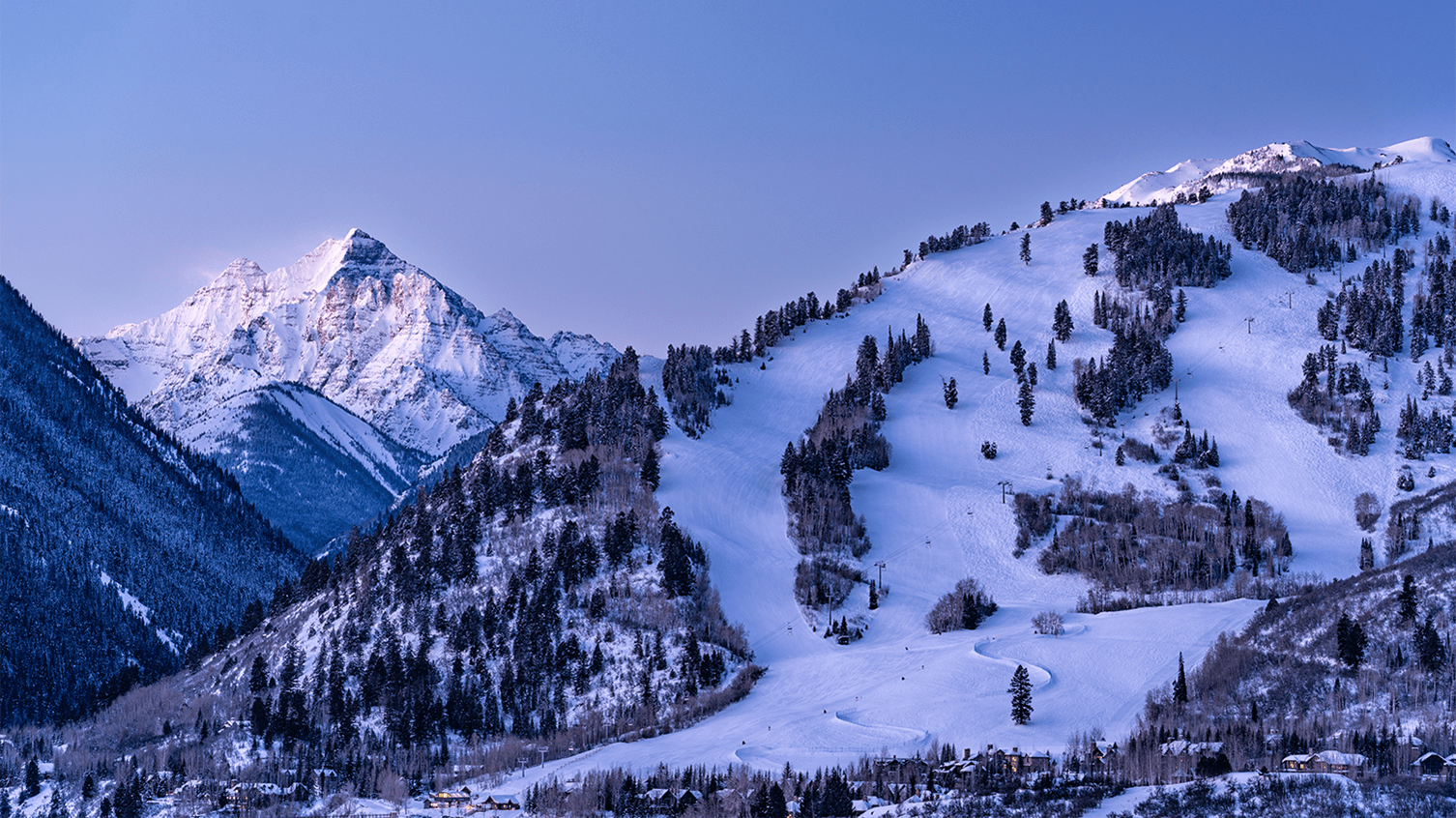 Buttermilk at dusk with the Maroon Bells in the background, at Aspen Snowmass 