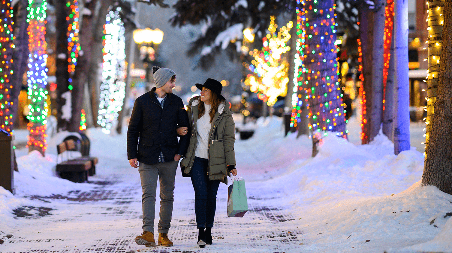 Couple in downtown Aspen during the holidays