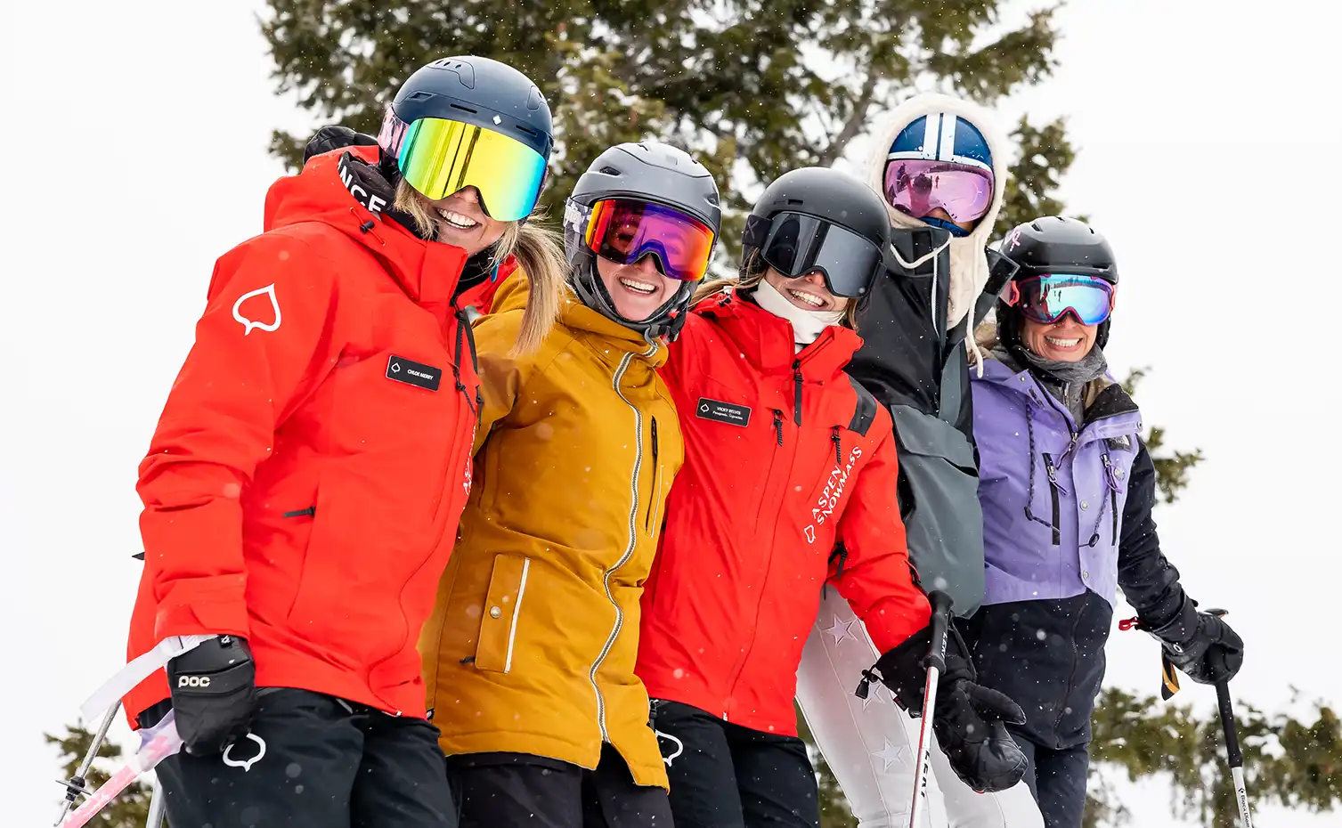 Group of adults enjoy their ski instruction at Aspen Snowmass