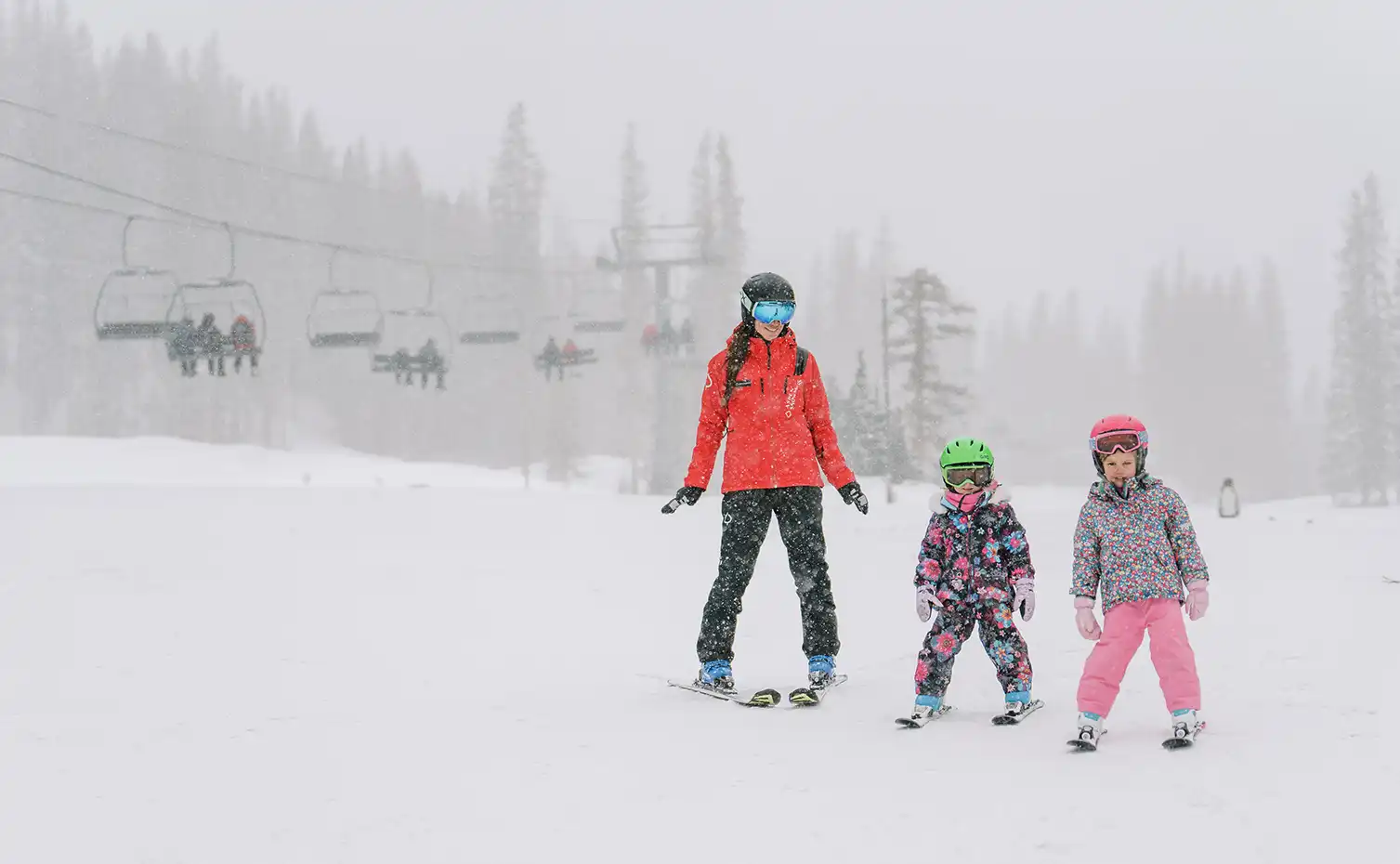 Group of young girls learn to ski with a child lesson at Snowmass