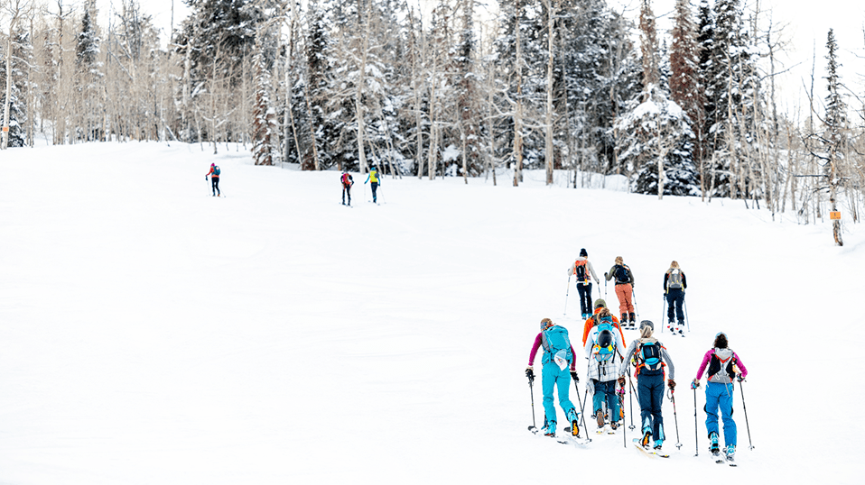 Groups of Women uphill at Buttermilk for International women's day