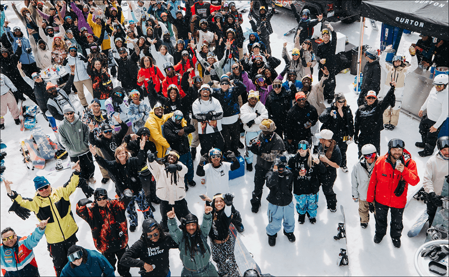 Aerial view of 2025 culture shifters with 30+ people smiling at camera
