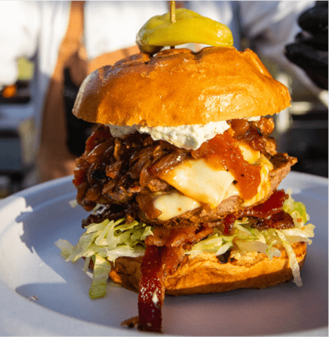 Crunchy chicken sandwich between toasted buns at Elk Camp dining in Snowmass