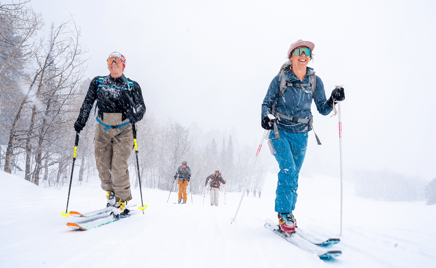 group of people uphilling for international womens day at buttermilk
