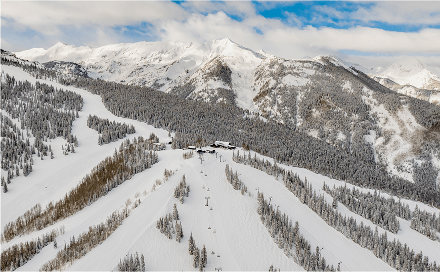Arial view of Snowmass's sams knob lift, on a sunny spring day at the end of the ski season
