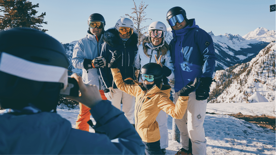 Family poses for a photo on snowmass mountain