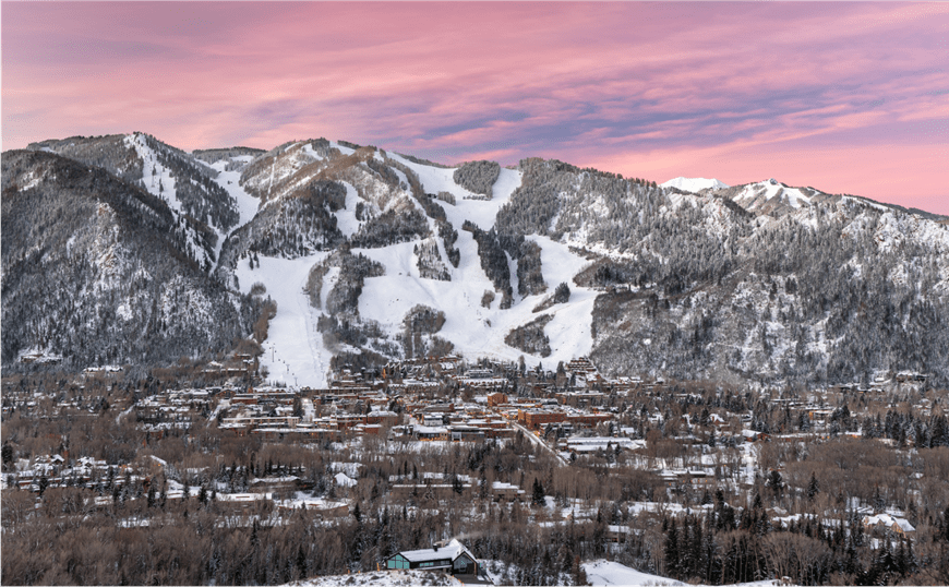 Pink skies over the town of Aspen on a winter day