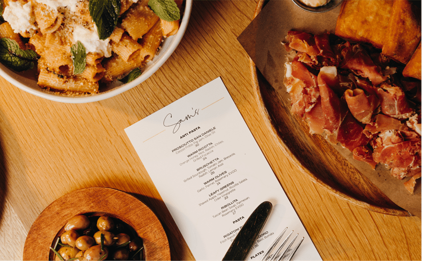 tablescape at Sam's, at Snowmass, with varias pasta dishes