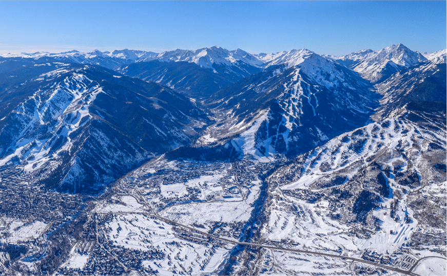 Blue skies over the blue mountains of aspen snowmass