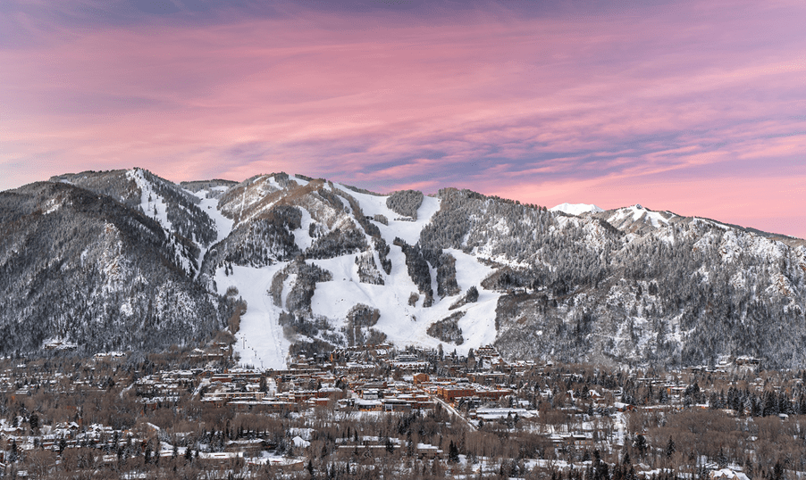 view of aspen mountain under pink skies