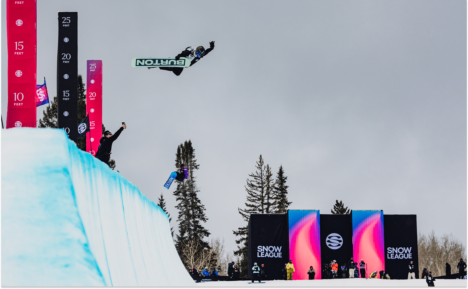 The Snow League Half pipe with someone doing a trick
