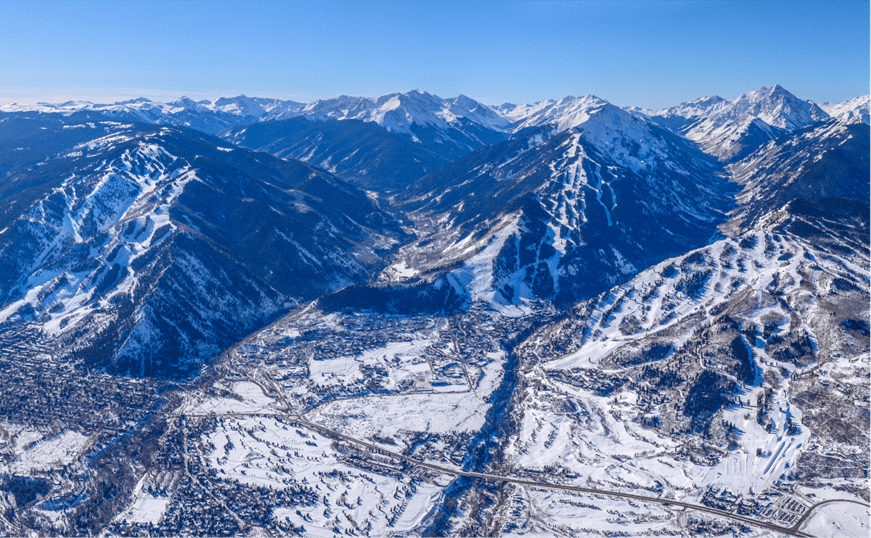 Aerial view of the aspen snowmass valley, 3 of the 4 ski resorts obvious