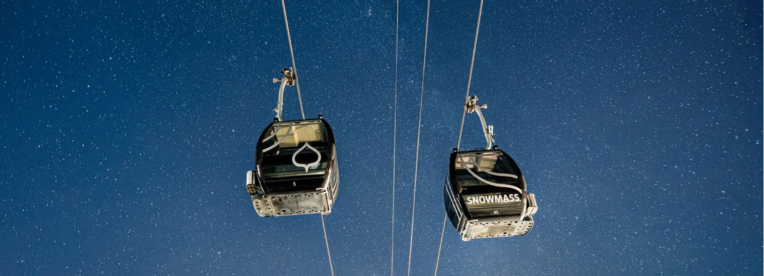 Two gondolas in the sky at snowmass colorado