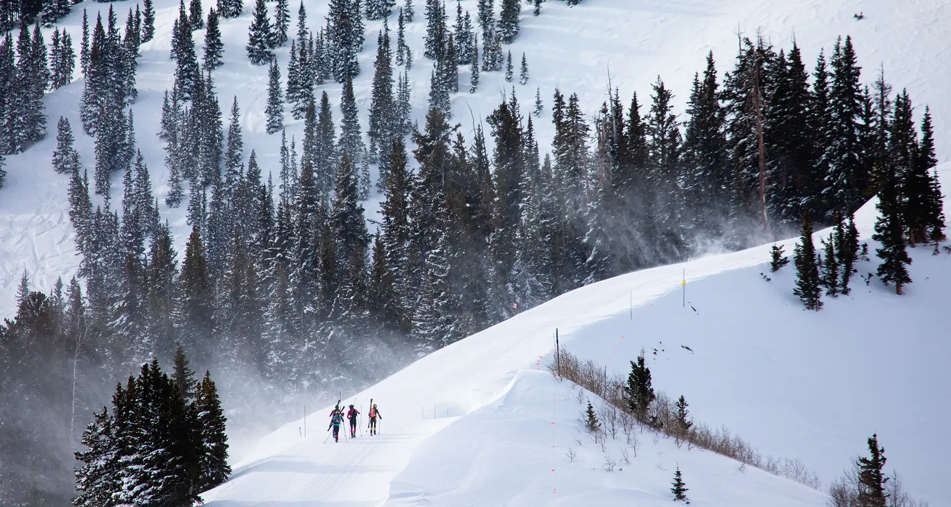Skiers climbing up Aspen Highlands' famous Highland Bowl during the Audi Power of Four Ski Mountaineering Race.