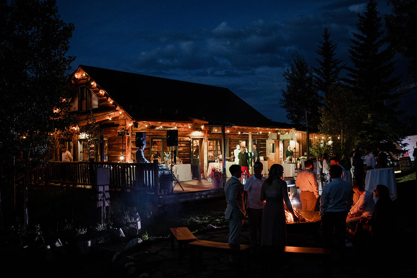 Lynn Britt Cabin wedding at night in summer