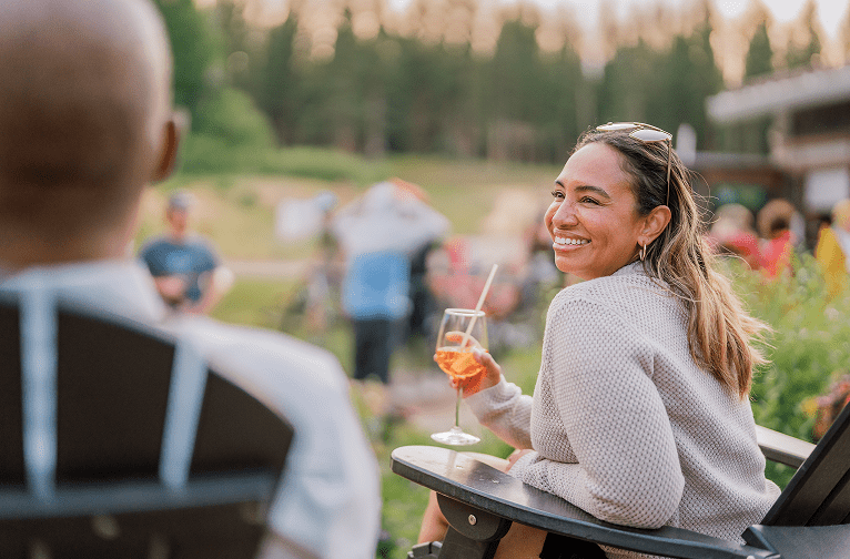 Women enjoying a cocktail at Elk Camp