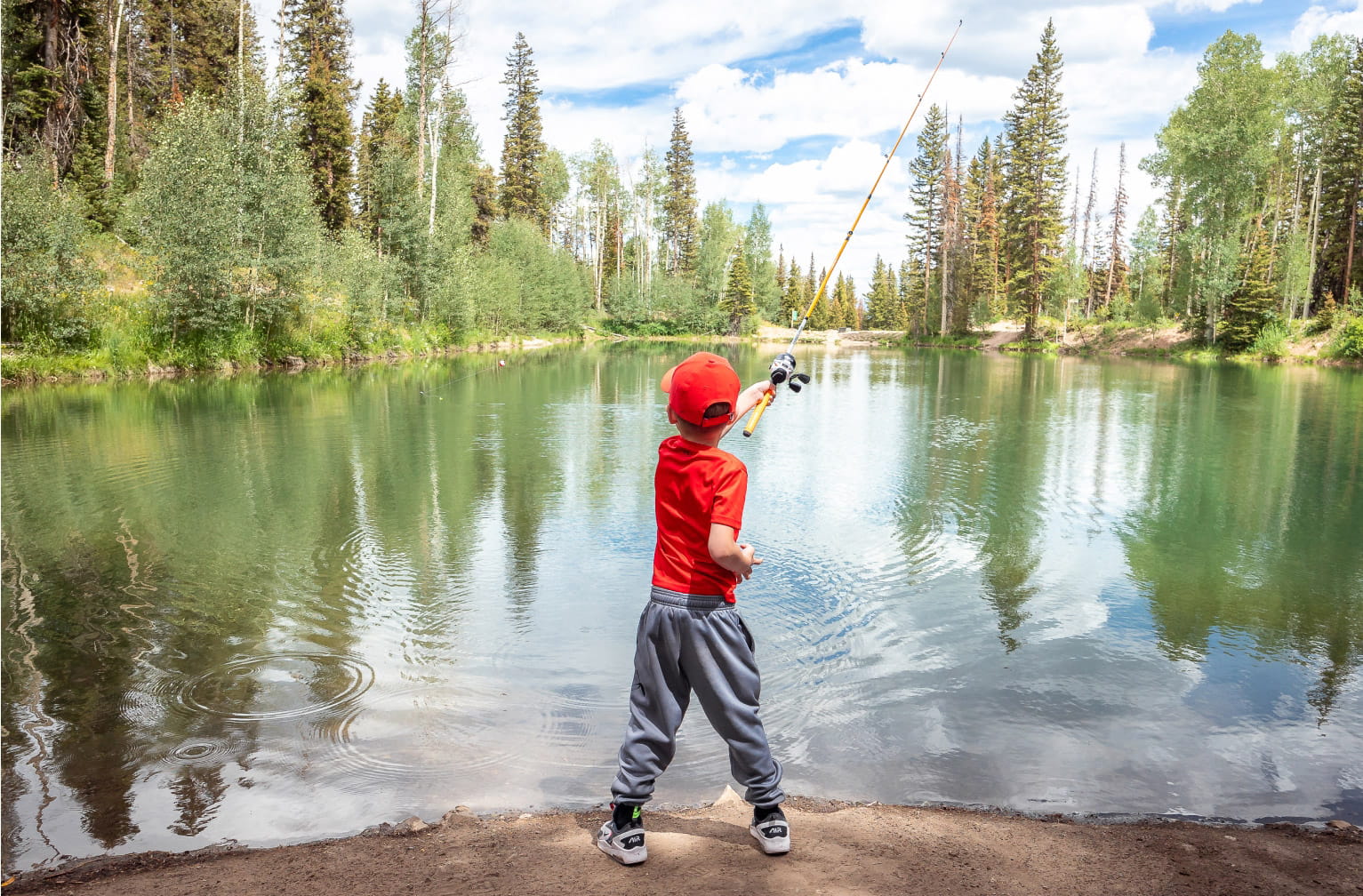 Child fishing on Snowmass mountain