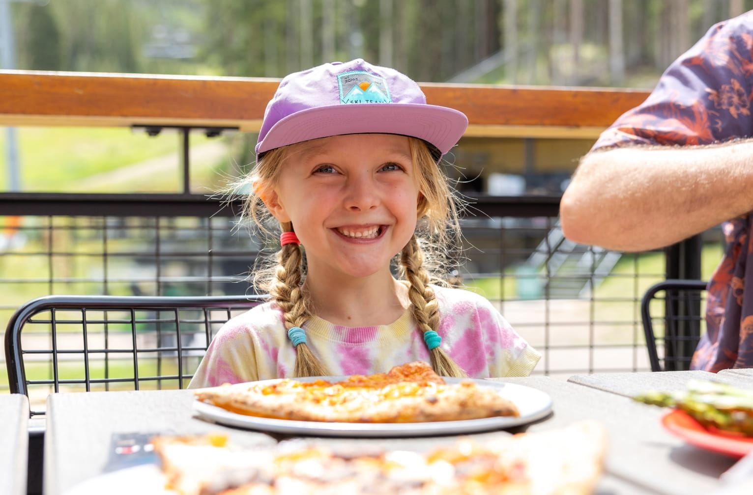 Child smiling at Elk Camp Restaurant