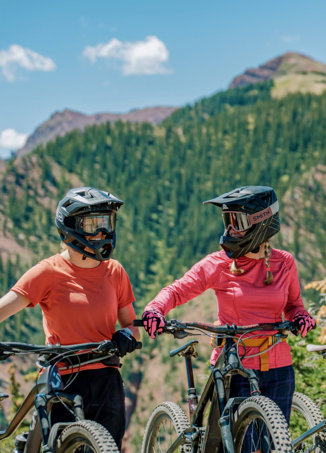 Two bikers stopped on a trail at Aspen Snowmass