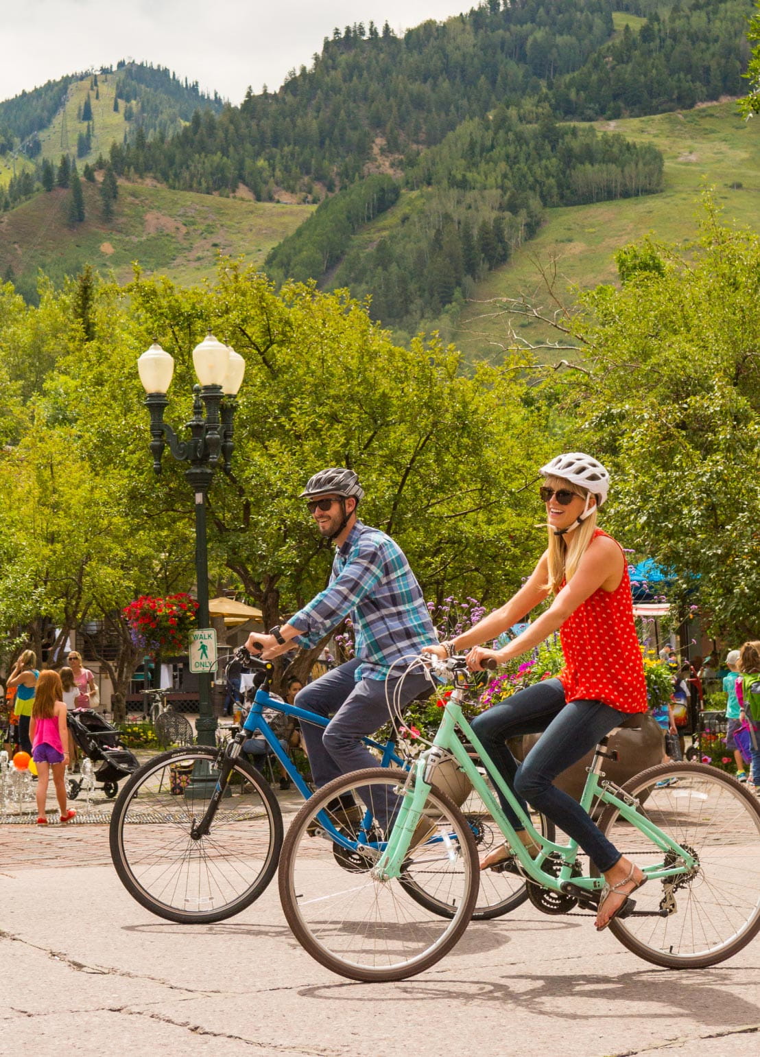 Two bikers in Downtown Aspen