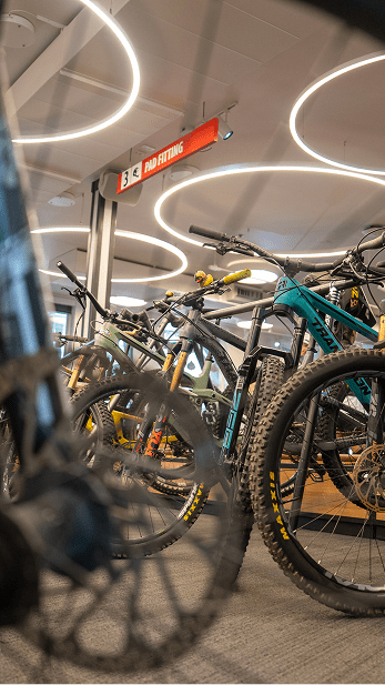 Inside of FMS in snowmass, many bike rentals available on the floor